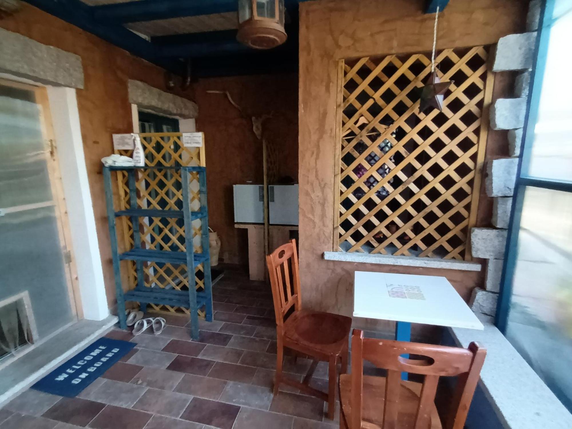 Portopollo Surfhouse Barrabisa Kültér fotó